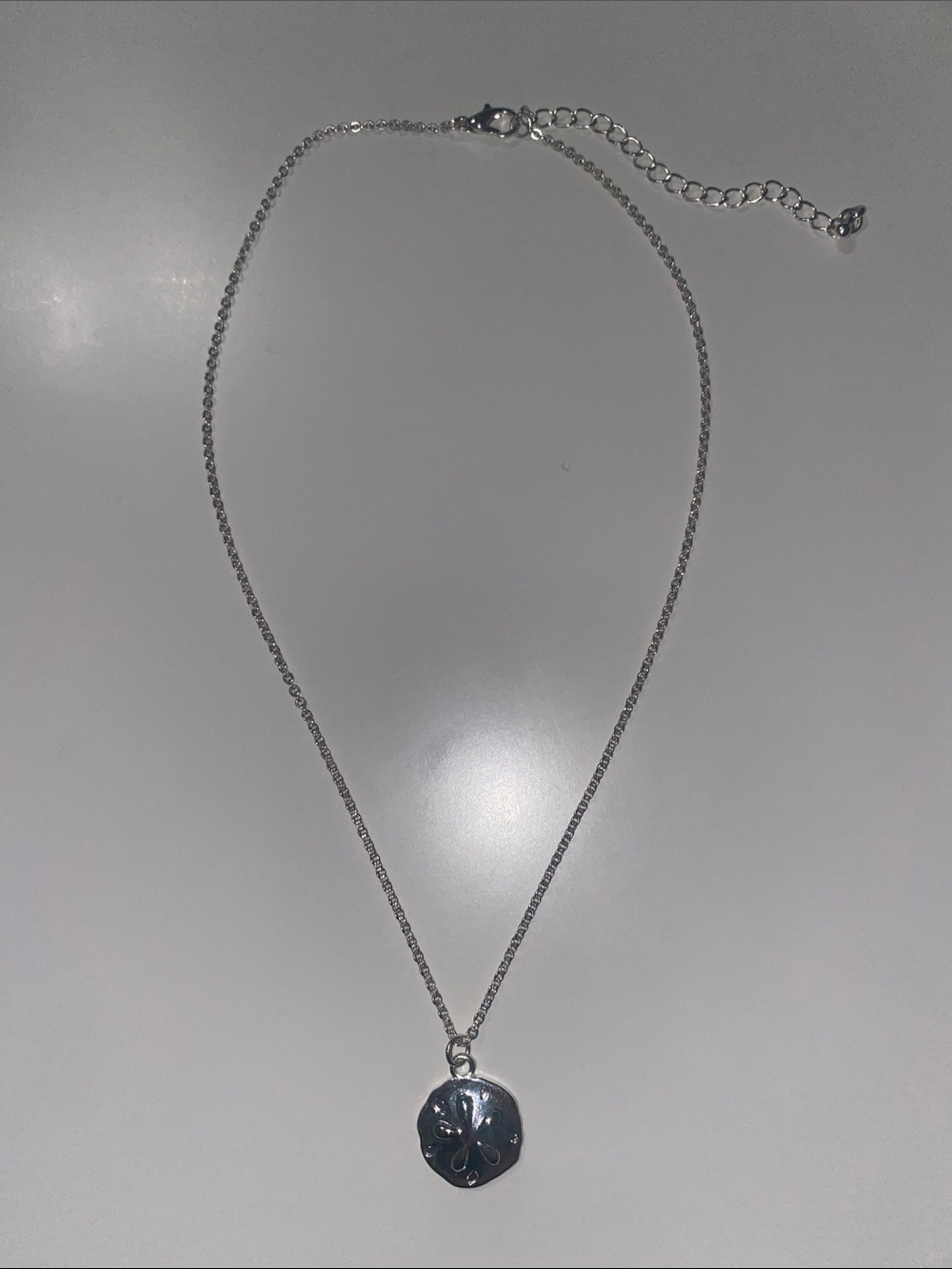 Silver Sand Dollar Pendant Necklace